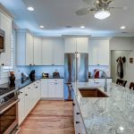 Beautiful luxury kitchen with quartz and granite countertops and modern appliances